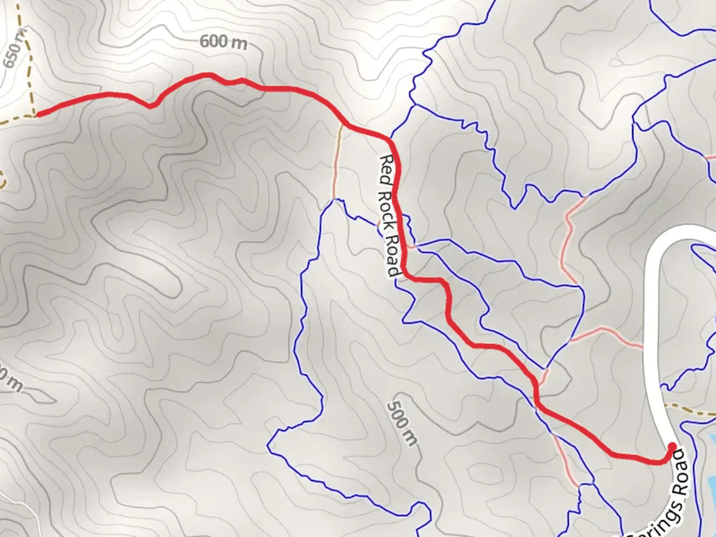 An image depicting the trail Red Rock Road and its surrounding area.