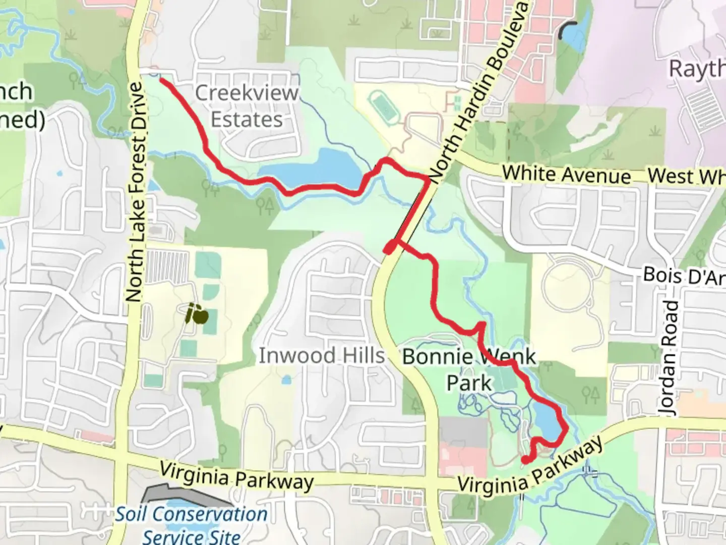 An image depicting the trail Walk along Wilson Creek - Bonnie Wenk Park and its surrounding area.
