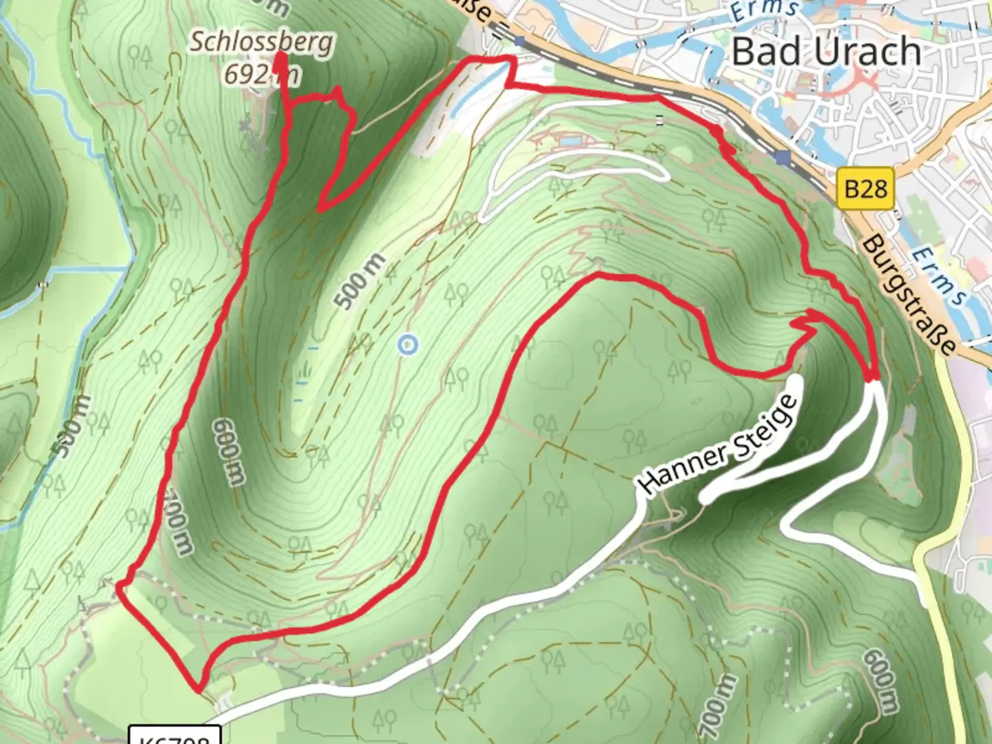 An image depicting the trail Burg Hohenurach Loop via Hohenurachsteig and its surrounding area.