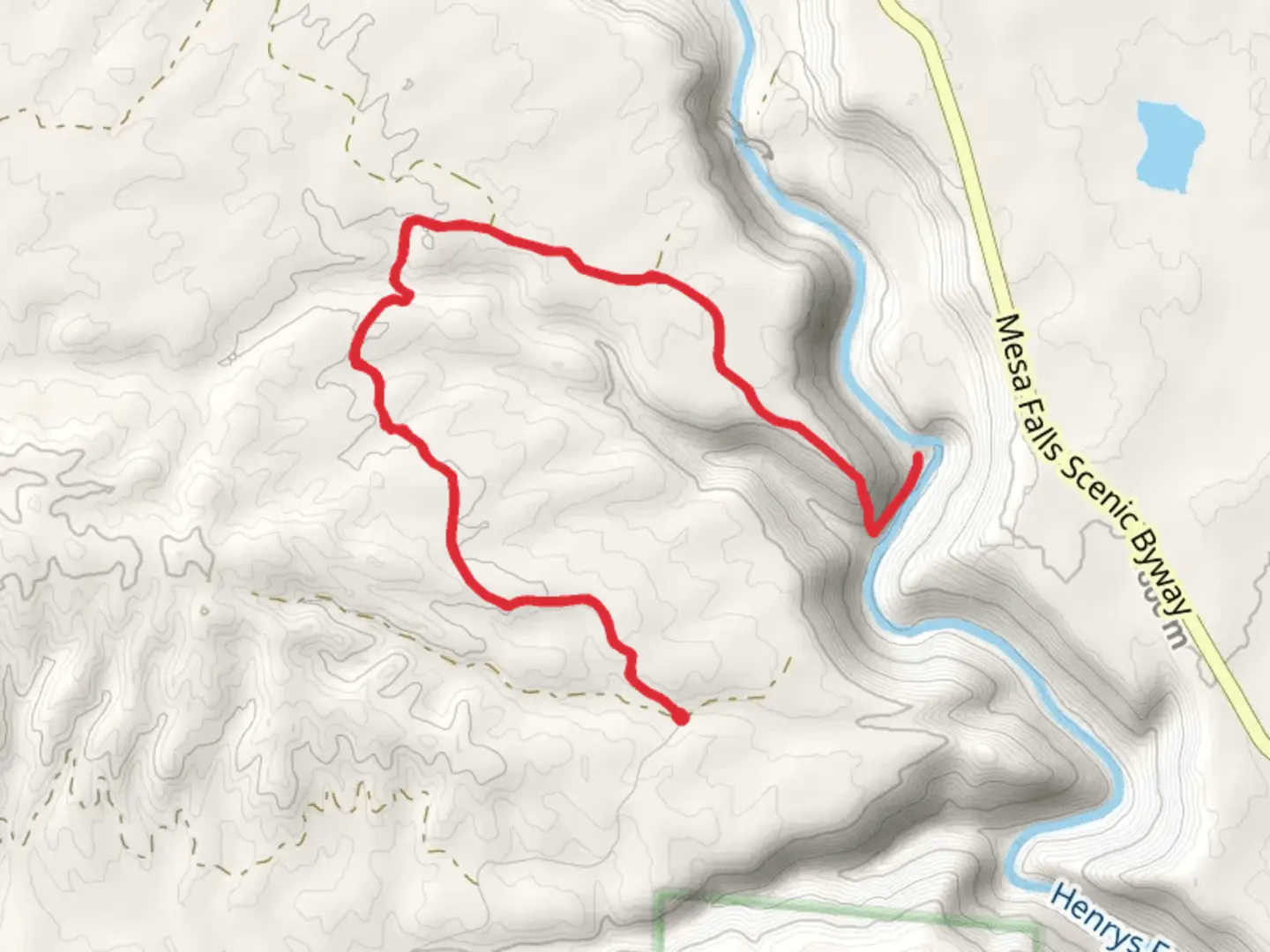 An image depicting the trail Henry's Fork Snake River from Anderson Mill Canyon Road and its surrounding area.