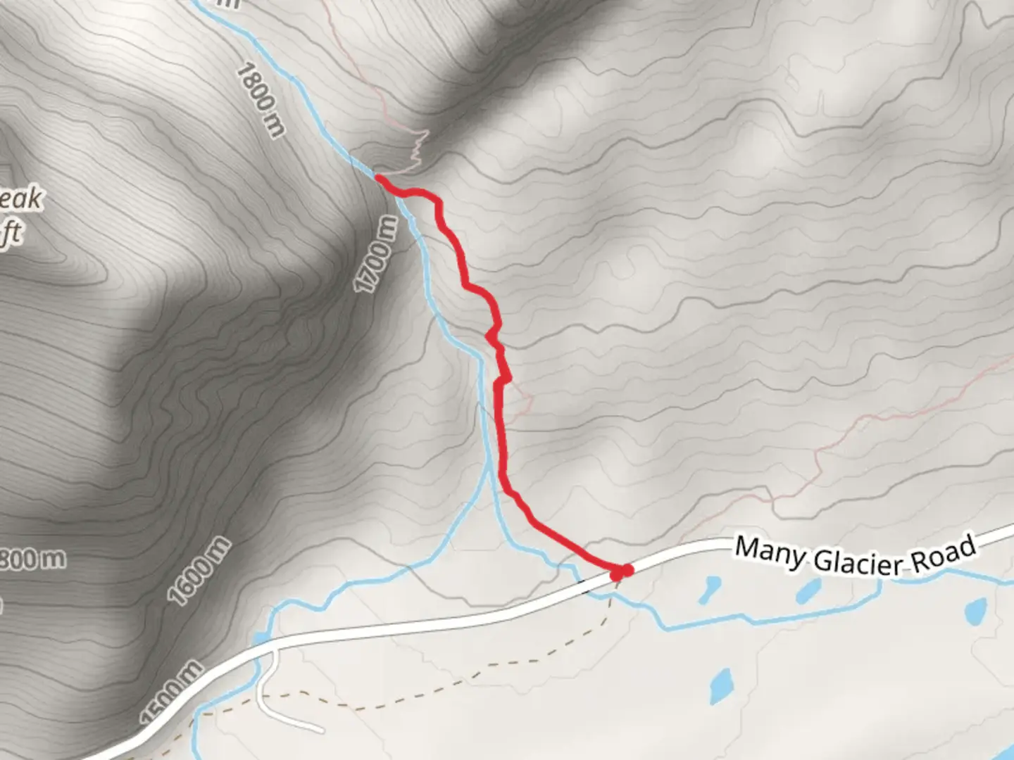 An image depicting the trail Apikuni Creek and its surrounding area.