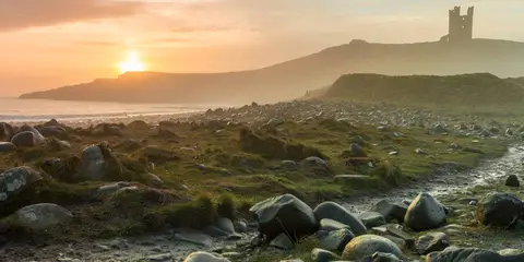 An image depicting the trail Northumberland Coast Path and its surrounding area.