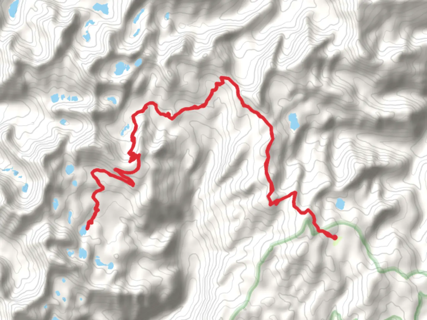 An image depicting the trail Reflection Lake via Puddin Mountain Trail and its surrounding area.