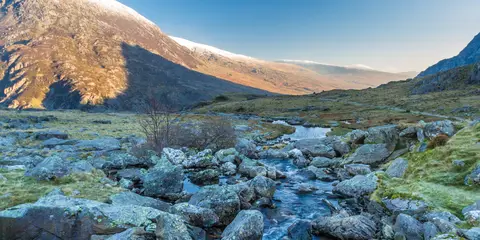 An image depicting the trail Carnedd Llewelyn via the Eastern Carneddau and its surrounding area.