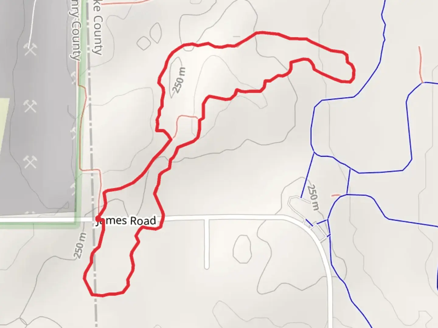 An image depicting the trail Chain O' Lakes State Park Loop Trail and its surrounding area.
