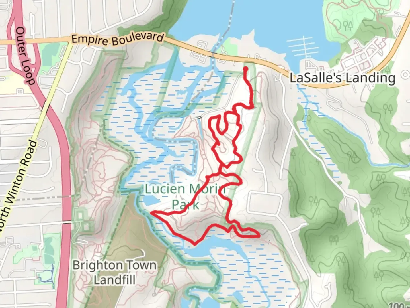 An image depicting the trail Irondequoit Creek - Blue Trail and its surrounding area.