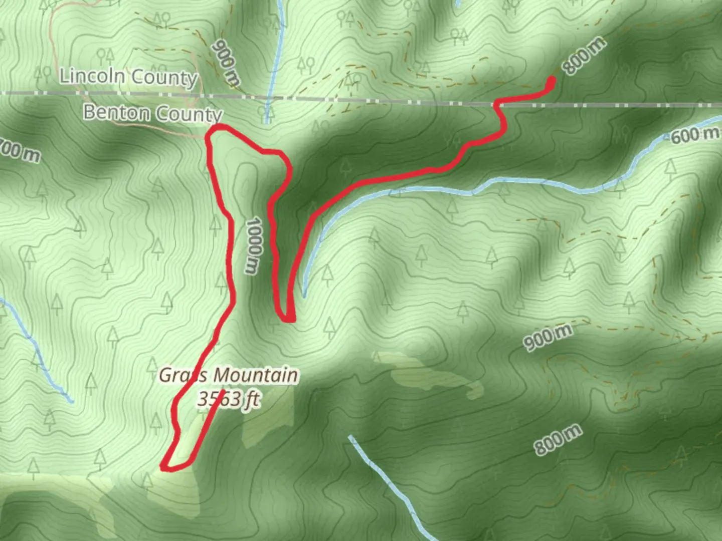 An image depicting the trail Grass Mountain via Grass Mountain North Ridge and its surrounding area.