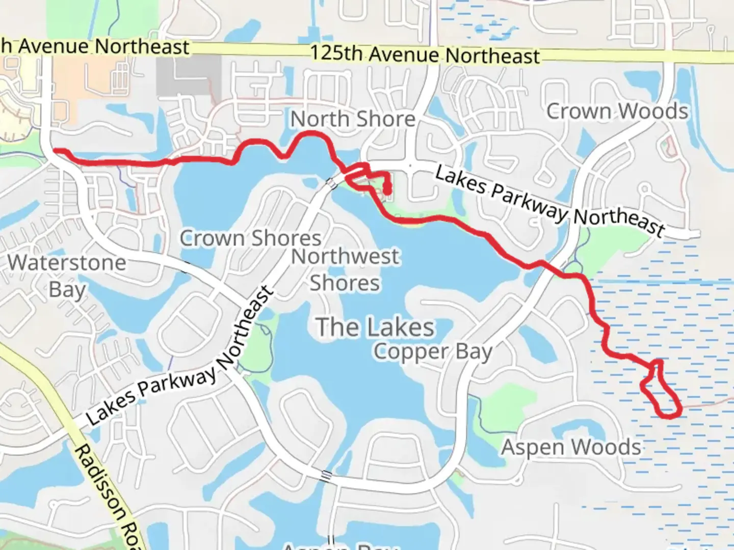 An image depicting the trail Bunker Chain of Lakes Regional Trail and its surrounding area.