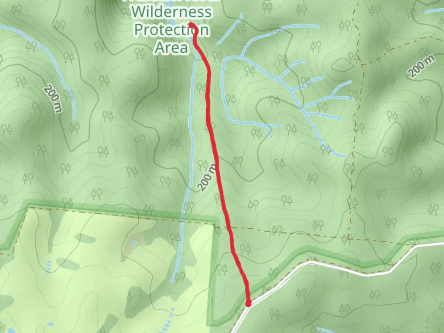 An image depicting the trail Billy Goat Waterfall Creek Hike and its surrounding area.