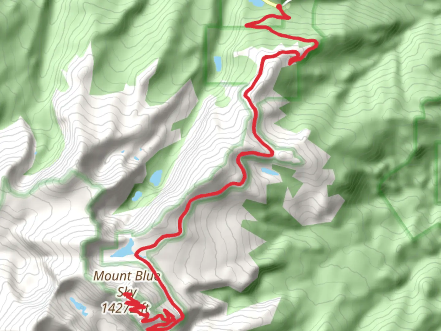 An image depicting the trail Mount Evans and Summit Lake Trail and its surrounding area.