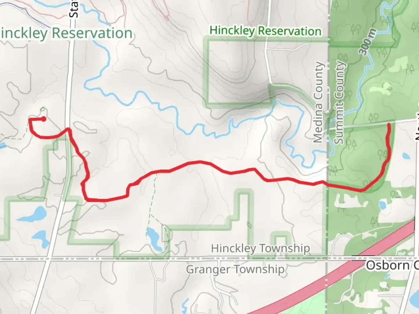 An image depicting the trail Carriage and Bridle Trail - State Road and its surrounding area.