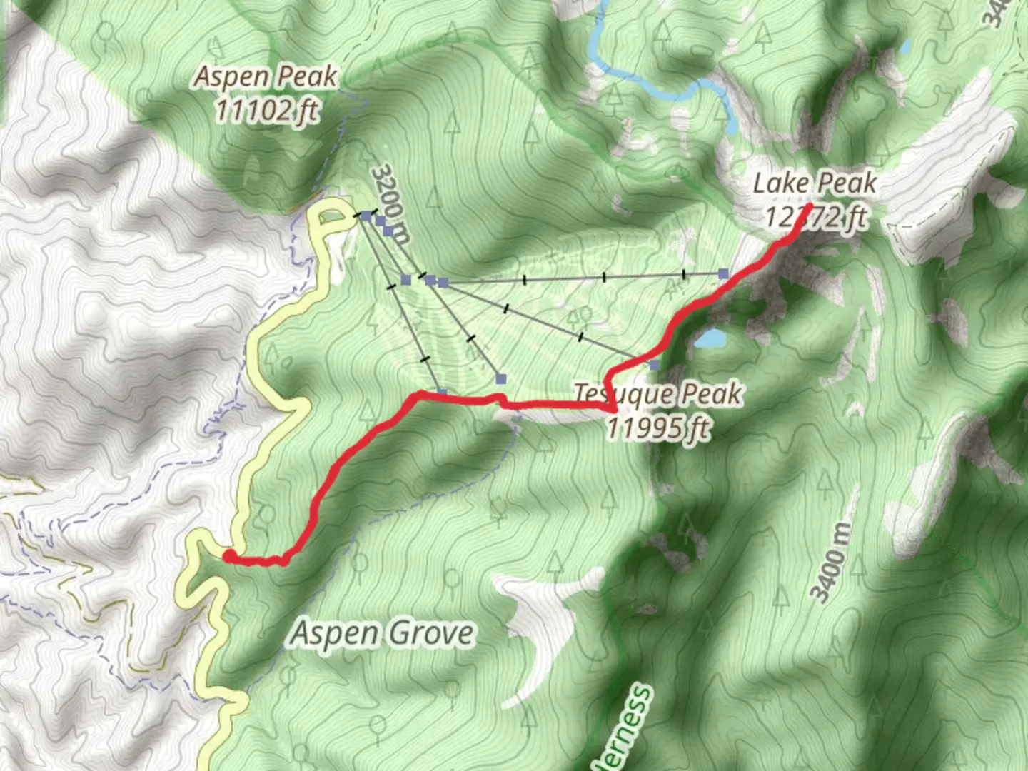 An image depicting the trail Deception Peak Lake Peak via Alamos Vista and its surrounding area.