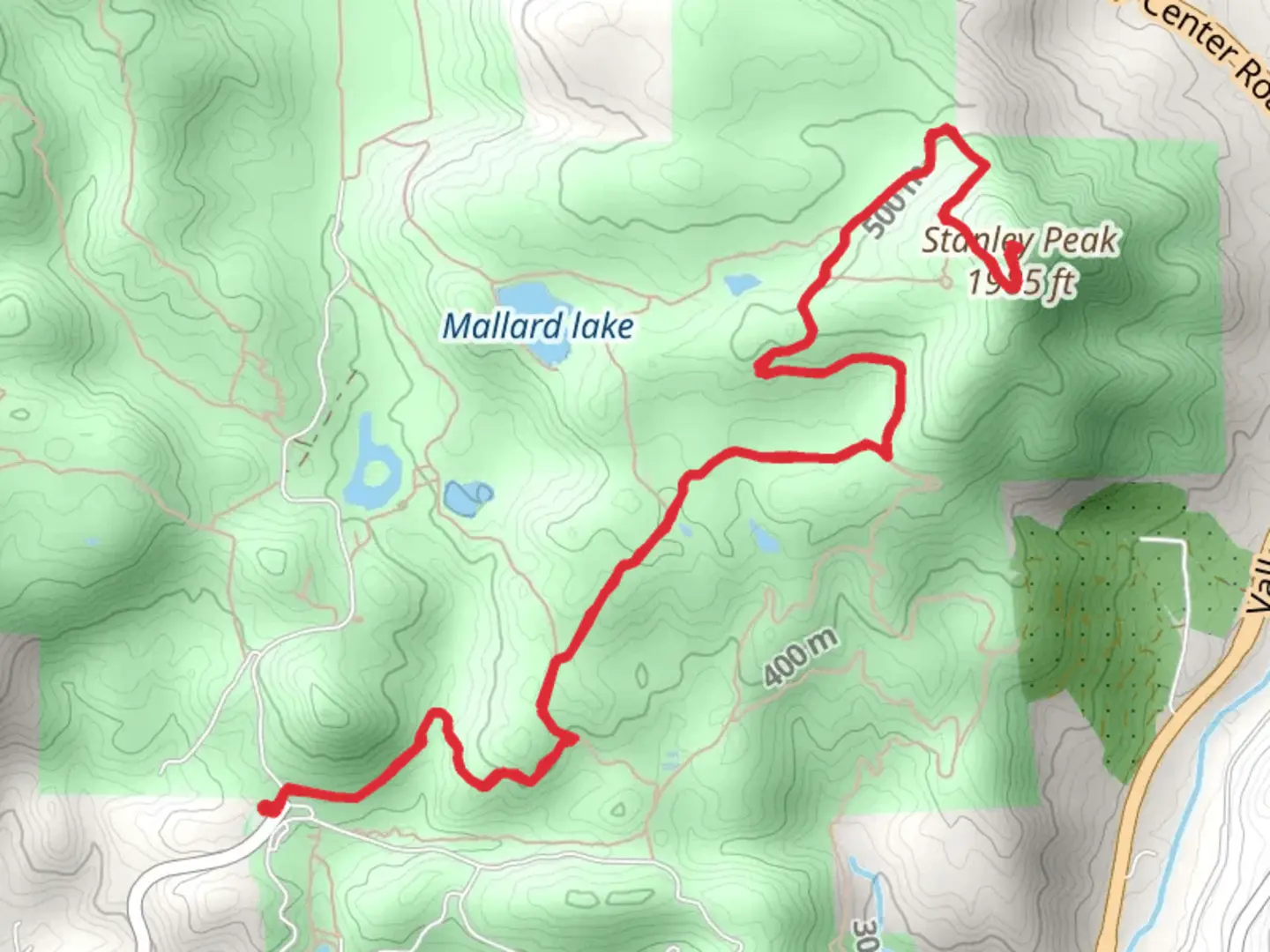 An image depicting the trail Stanley Peak via Coyote Run Trail and its surrounding area.