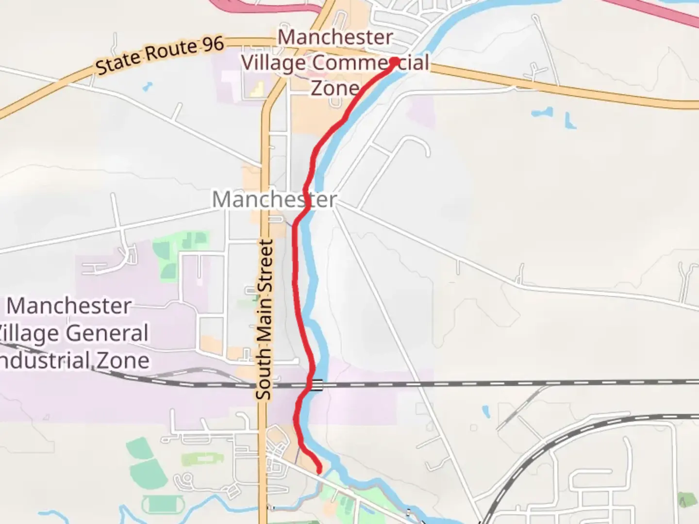 An image depicting the trail Canandaigua Outlet Creek from North Main Street and its surrounding area.