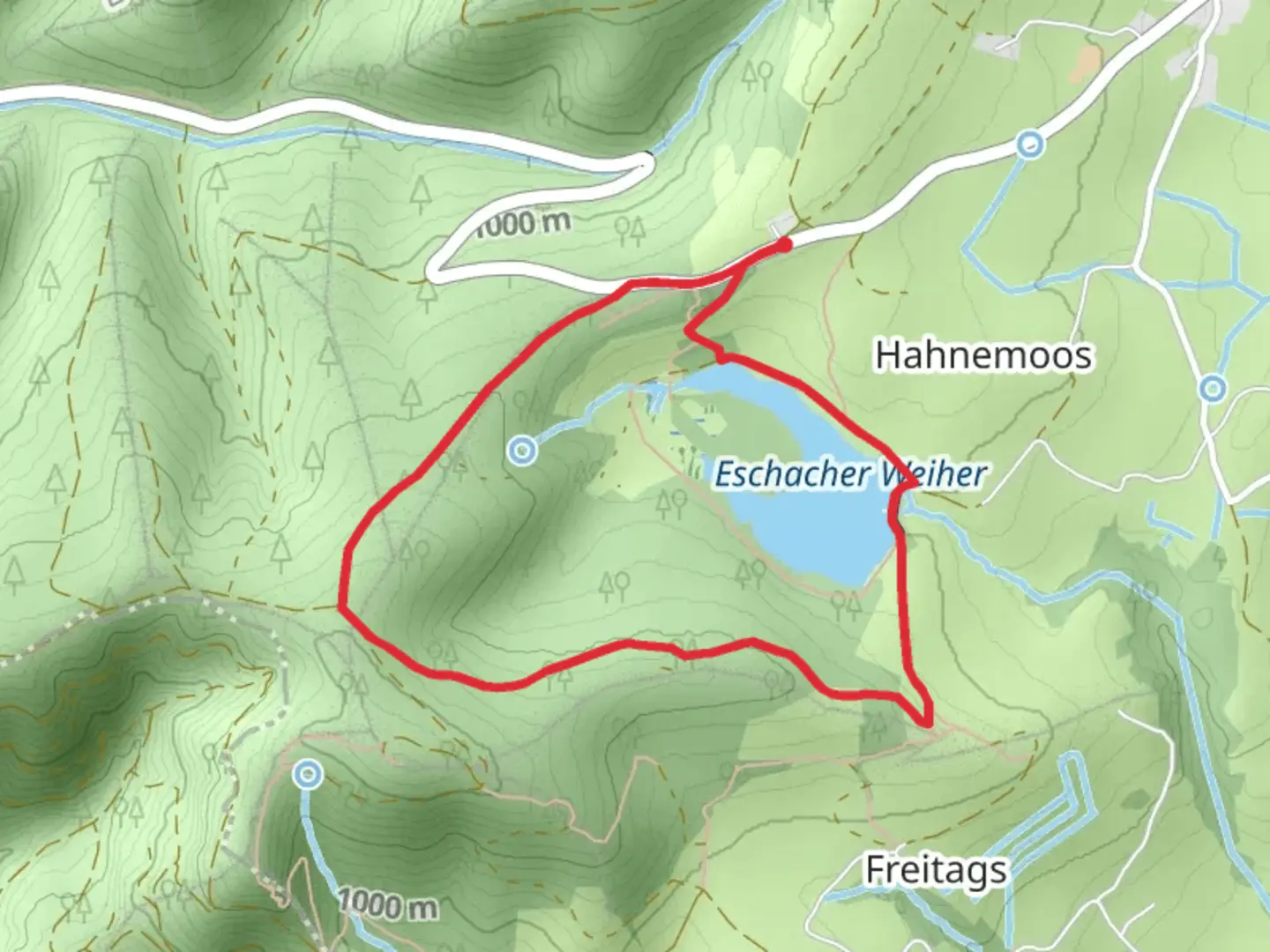 An image depicting the trail Eschacher Weiher Loop and its surrounding area.