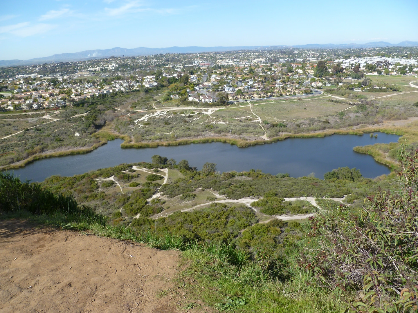 An image depicting the trail Calavera Lake Loop via Viewpoint Trail and its surrounding area.