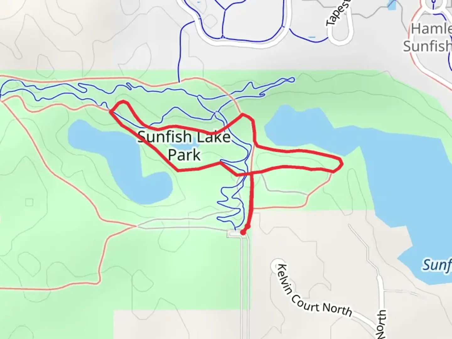 An image depicting the trail Sunfish Lake Park Overlook and its surrounding area.