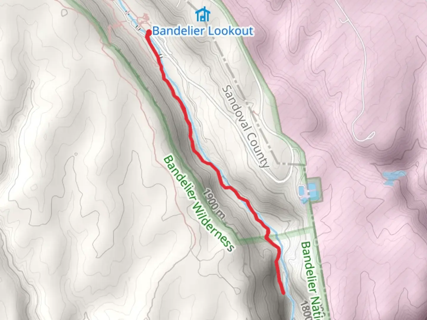 An image depicting the trail Upper Frijoles Falls and Lower Frijoles Falls and its surrounding area.