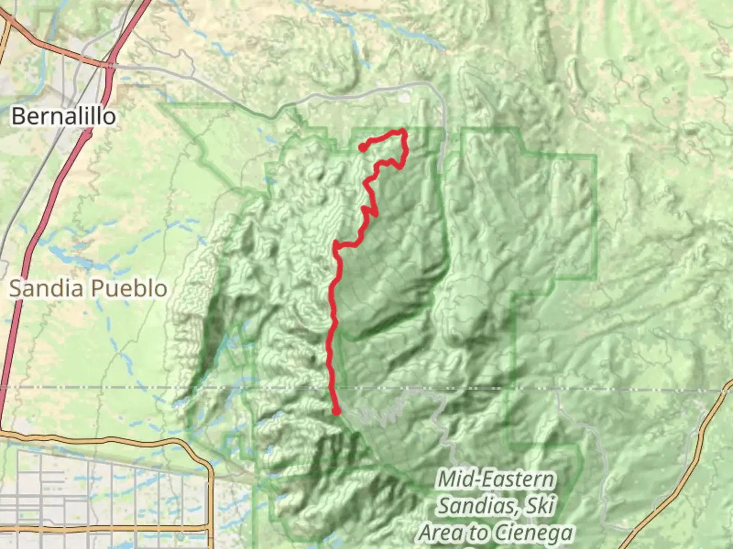 An image depicting the trail Sandia Crest Point to Point and its surrounding area.
