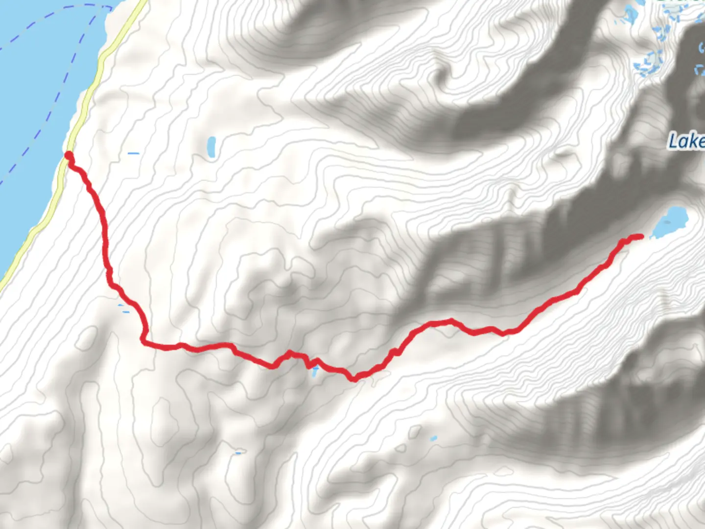 An image depicting the trail Lincoln Lake from Lake McDonald and its surrounding area.