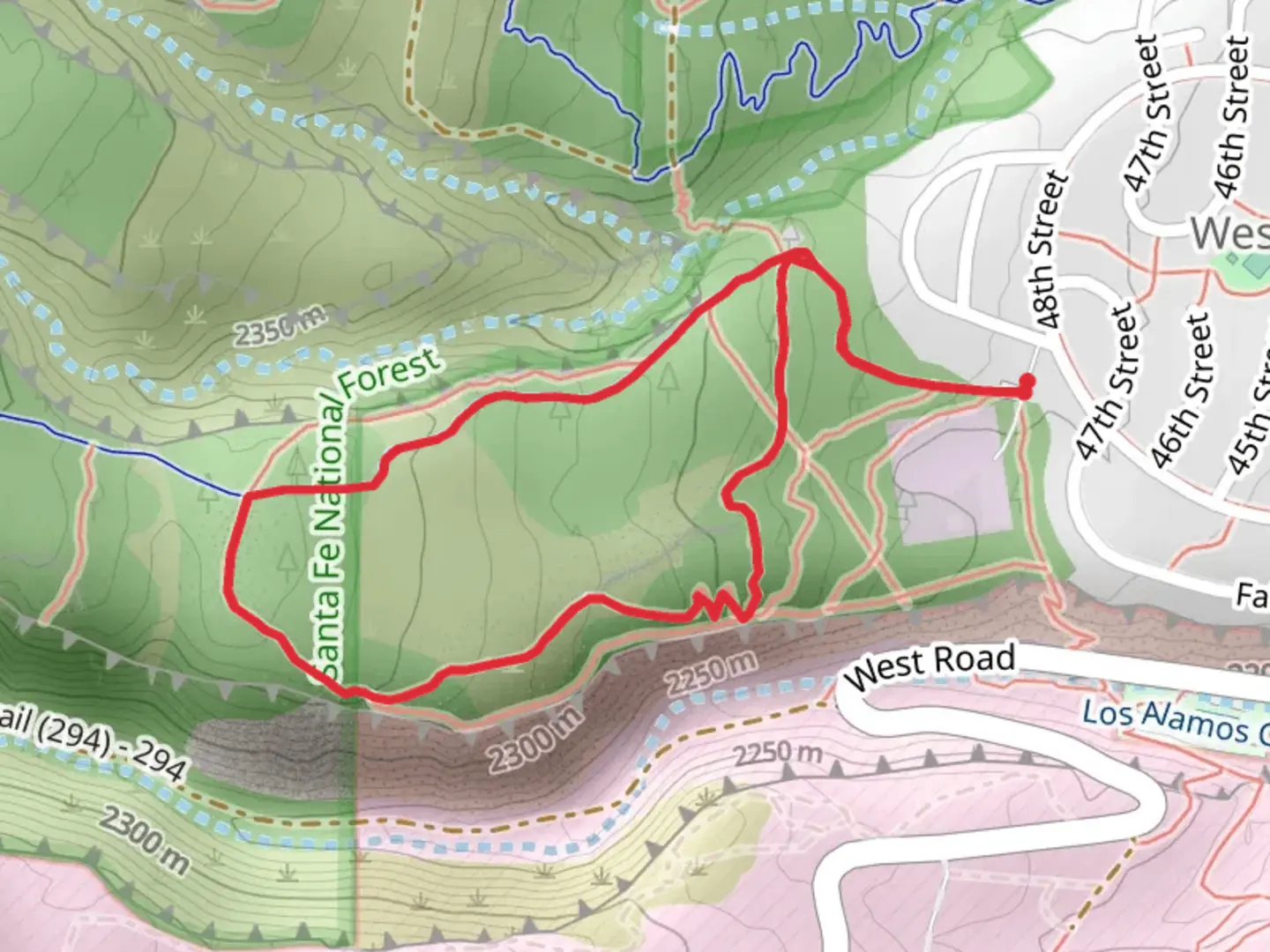 An image depicting the trail Quemazon Nature Loop Trail and its surrounding area.