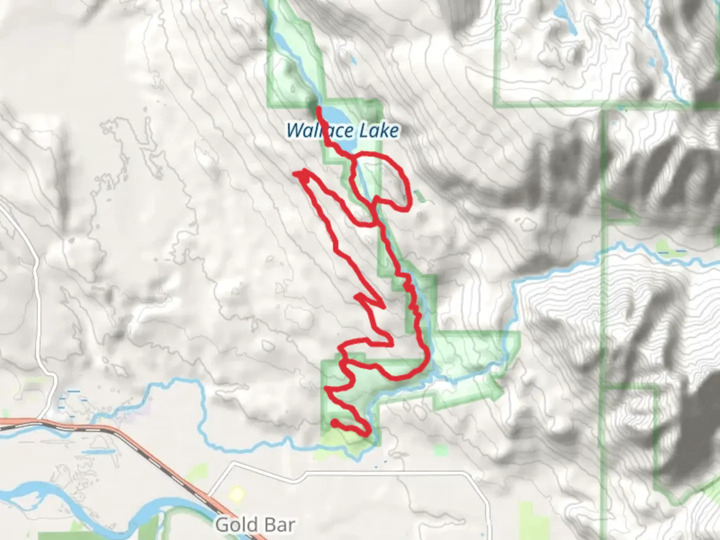 An image depicting the trail Woody, Wallace Lake and Greg Ball Loop Trail and its surrounding area.