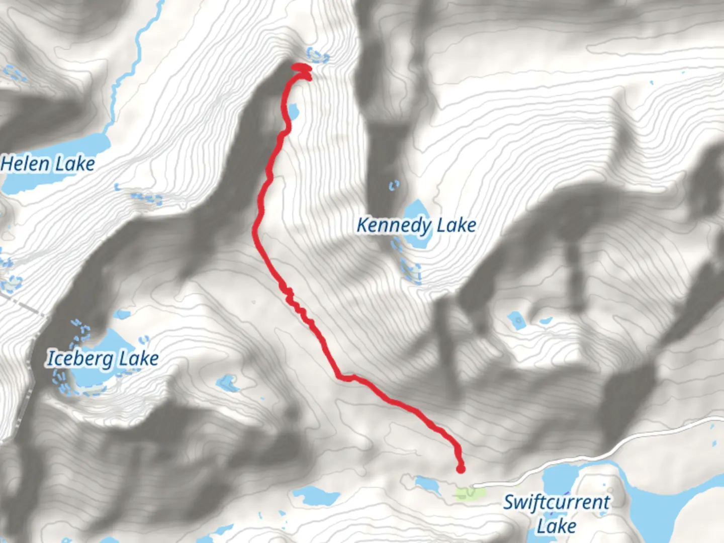 An image depicting the trail Ptarmigan Lake from Swiftcurrent Cabins Road and its surrounding area.