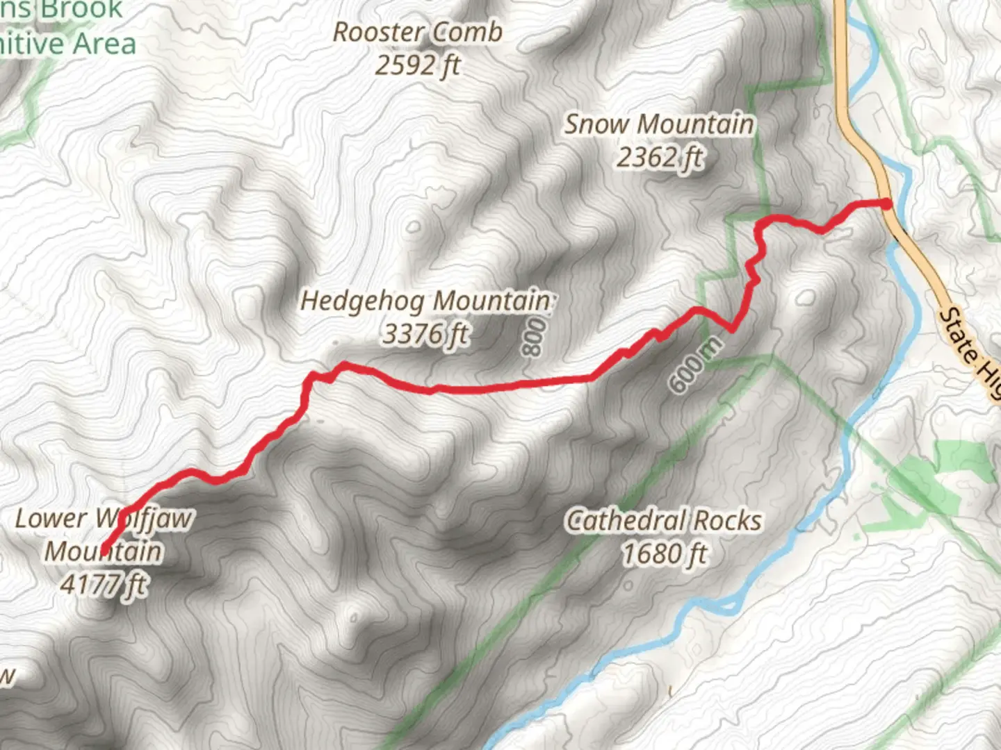 An image depicting the trail Lower Wolfjaw Mountain and its surrounding area.