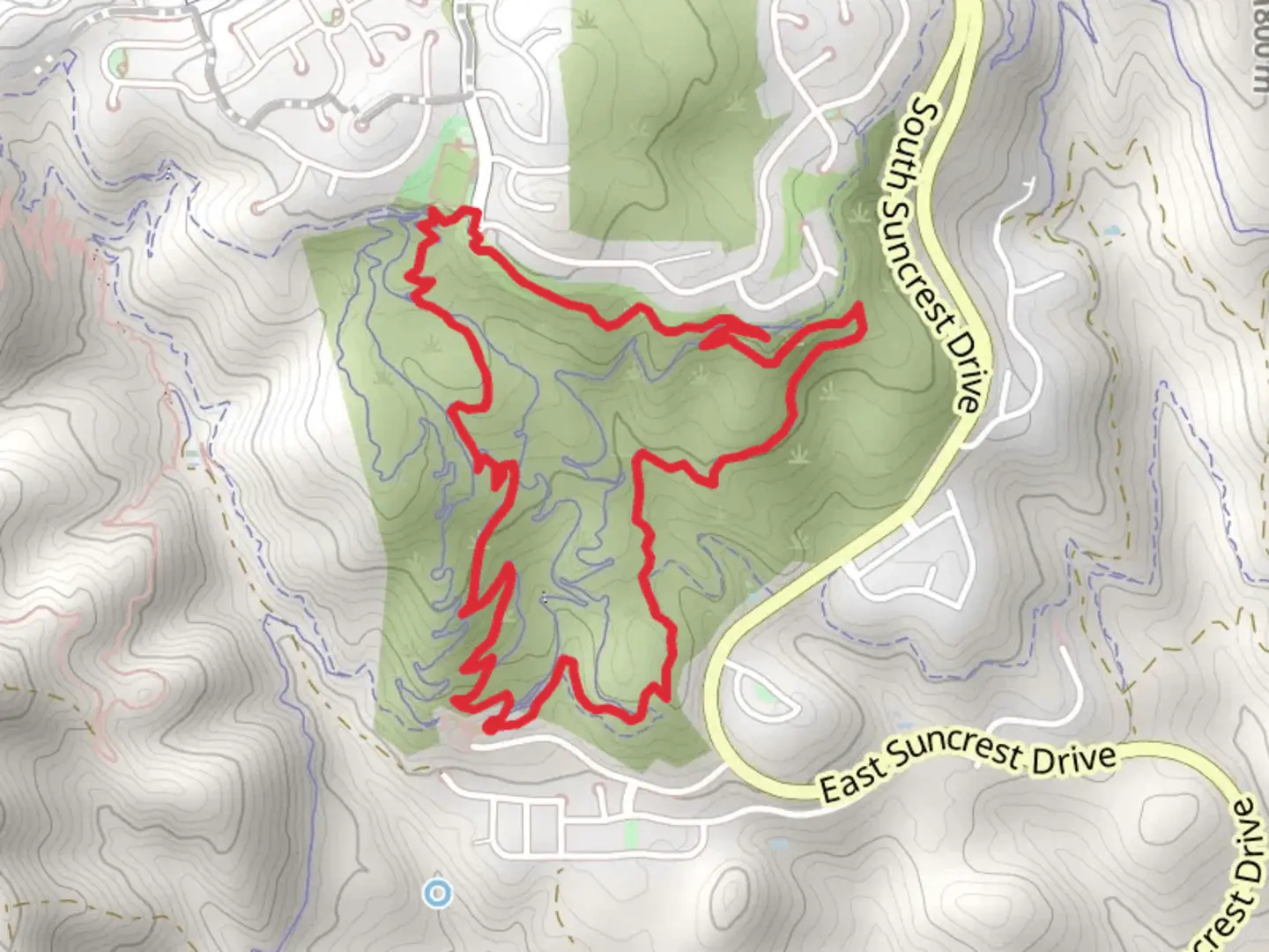 An image depicting the trail Woods Hollow and Vertigo Trail DH Loop and its surrounding area.
