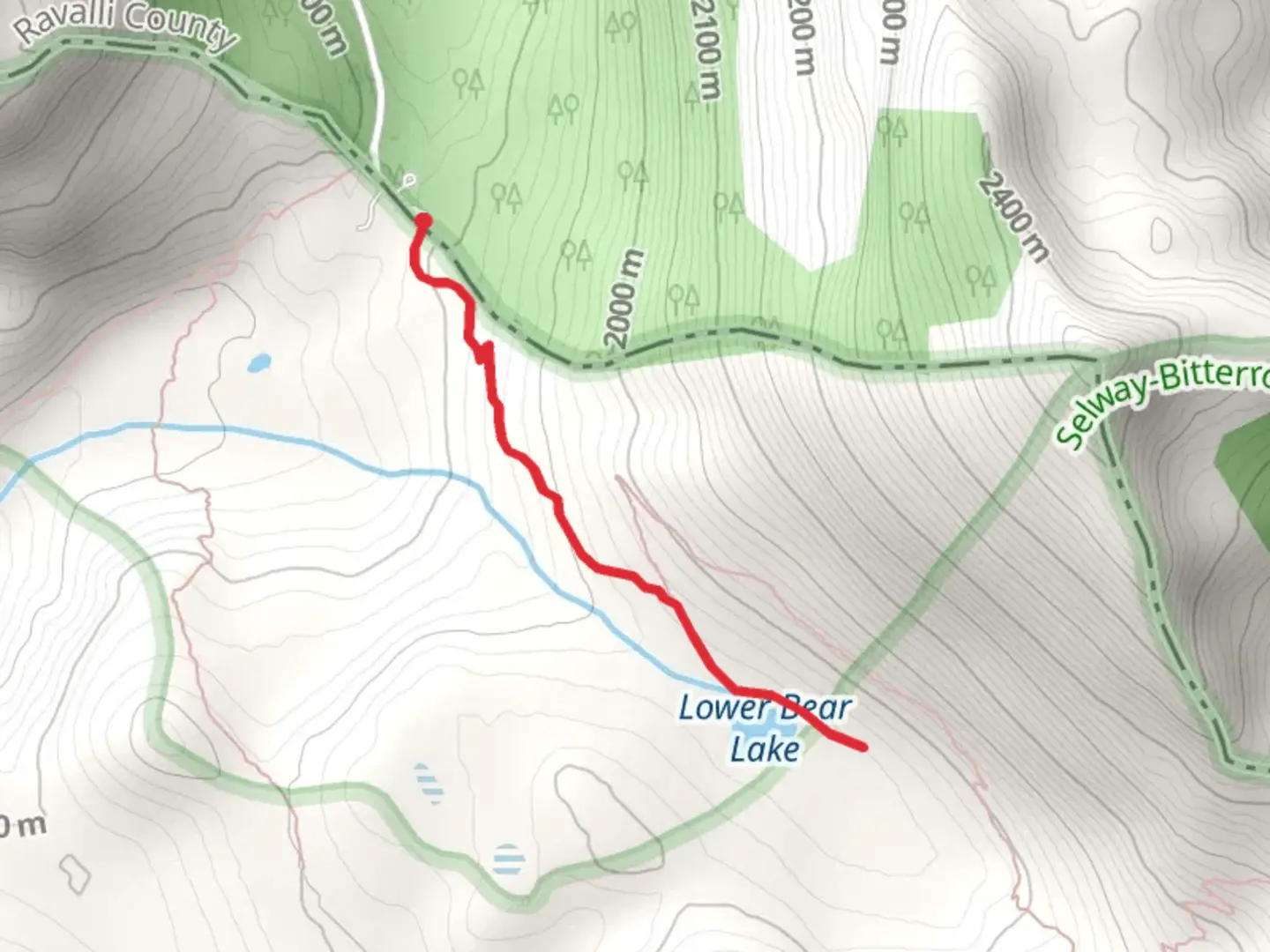 An image depicting the trail Lower Bear Lake and its surrounding area.