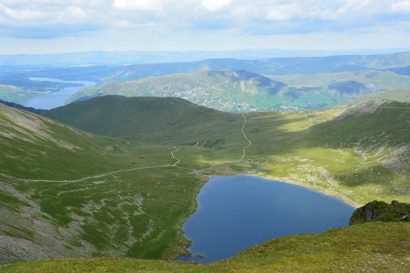 An image depicting the trail Striding Edge and Helvellyn Loop and its surrounding area.