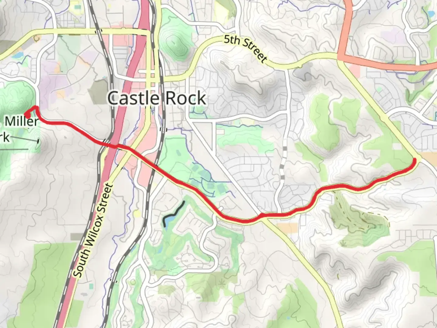 An image depicting the trail Plum Creek Parkway Trail and its surrounding area.