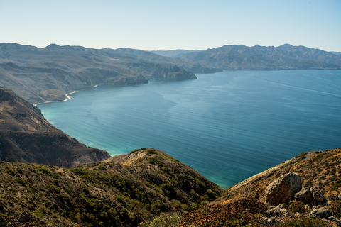 An image depicting the trail Chinese Harbor via Del Norte Trail and its surrounding area.