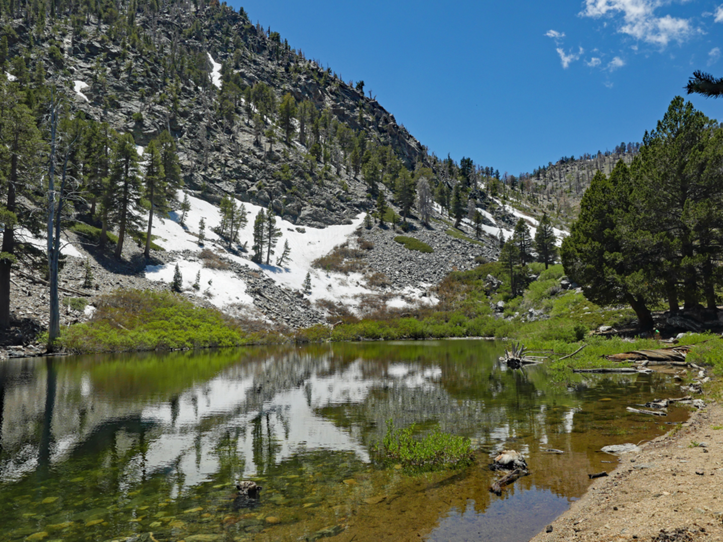 An image depicting the trail Dollar Lake via Fish Creek Trail and its surrounding area.