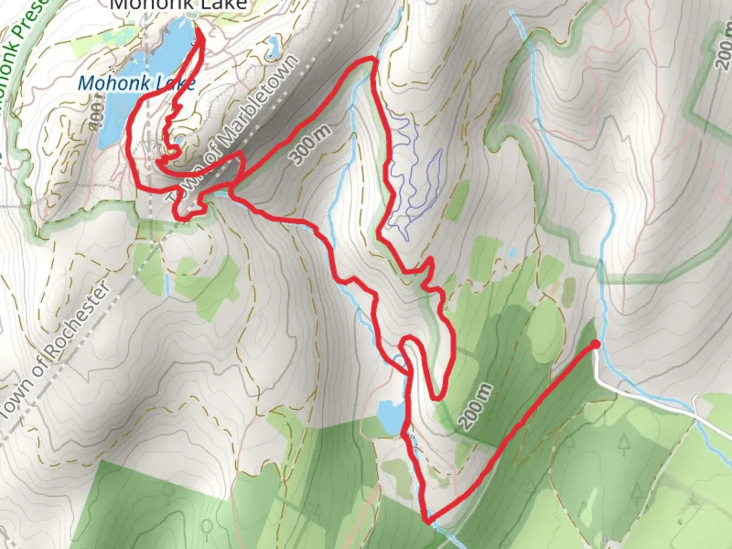 An image depicting the trail Skytop Reservoir and Mohonk Lake Loop Trail via Duck Pond and its surrounding area.