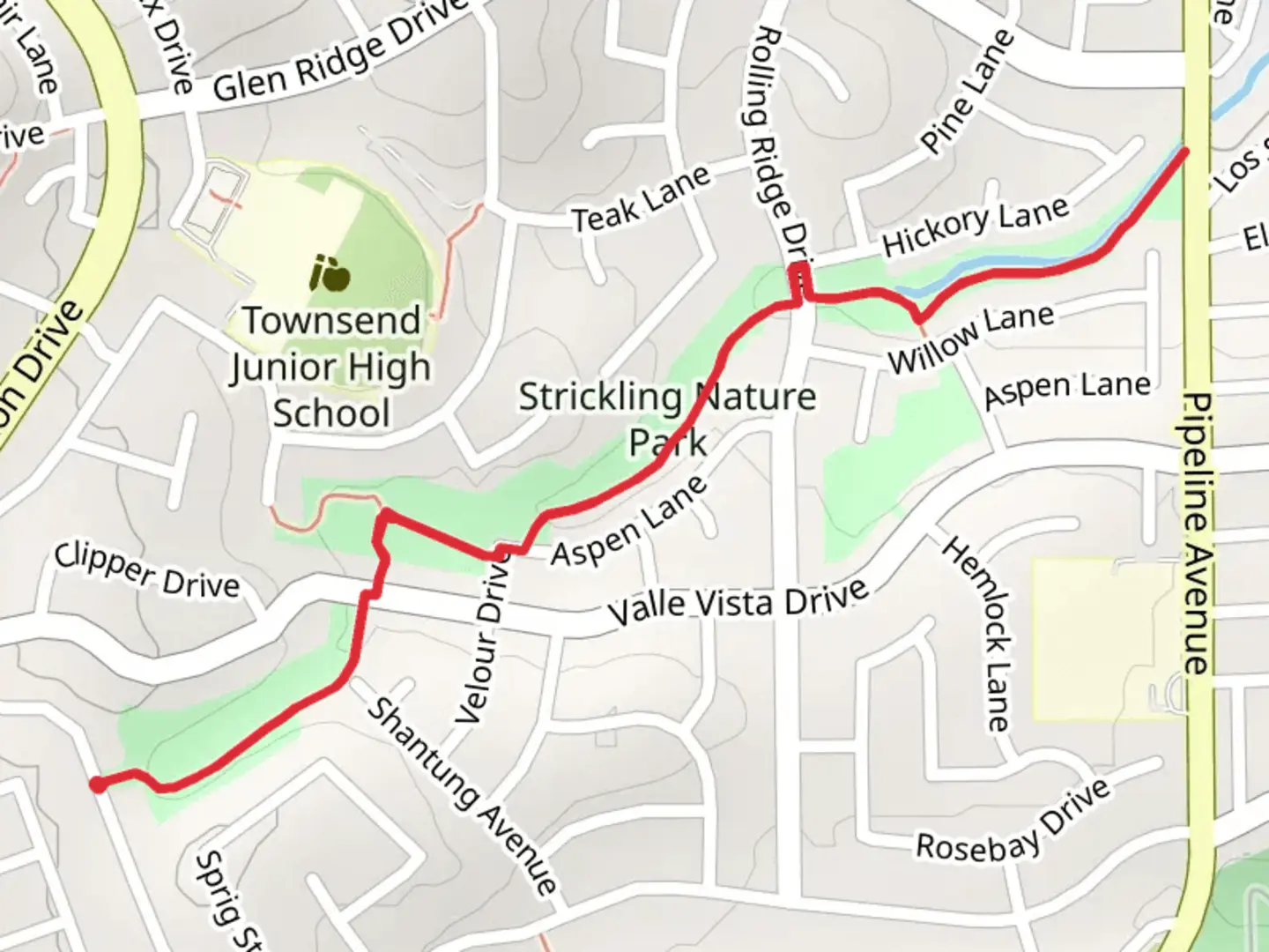 An image depicting the trail Strickling and Hickory Creek Nature Park and its surrounding area.