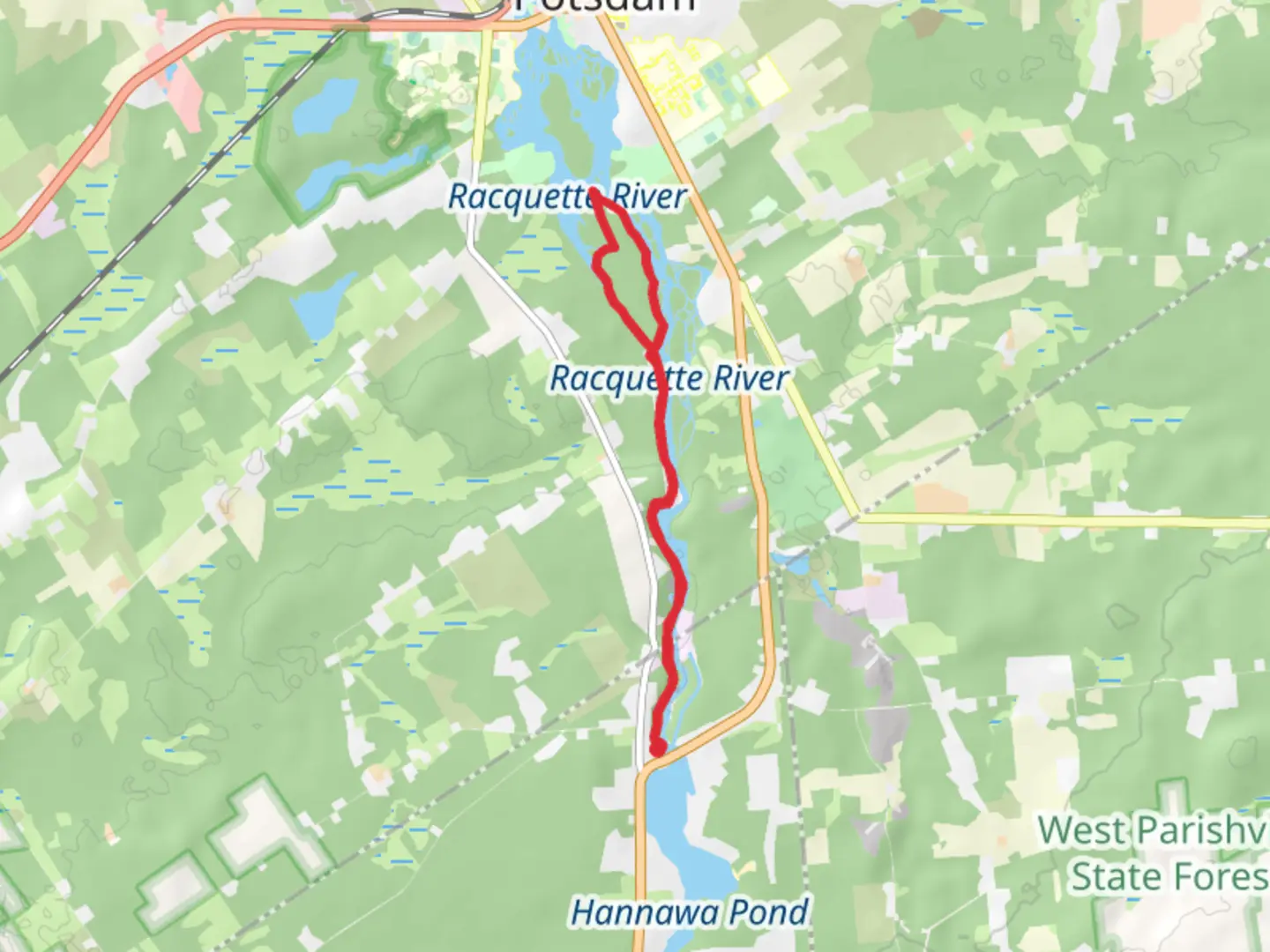 An image depicting the trail Raquette River from Mill Street and its surrounding area.