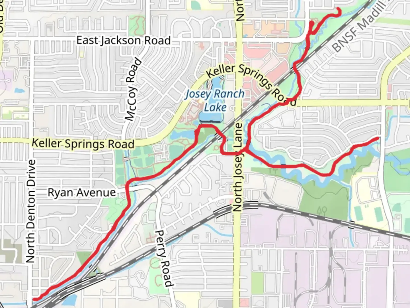 An image depicting the trail Hutton Branch green Trail and its surrounding area.