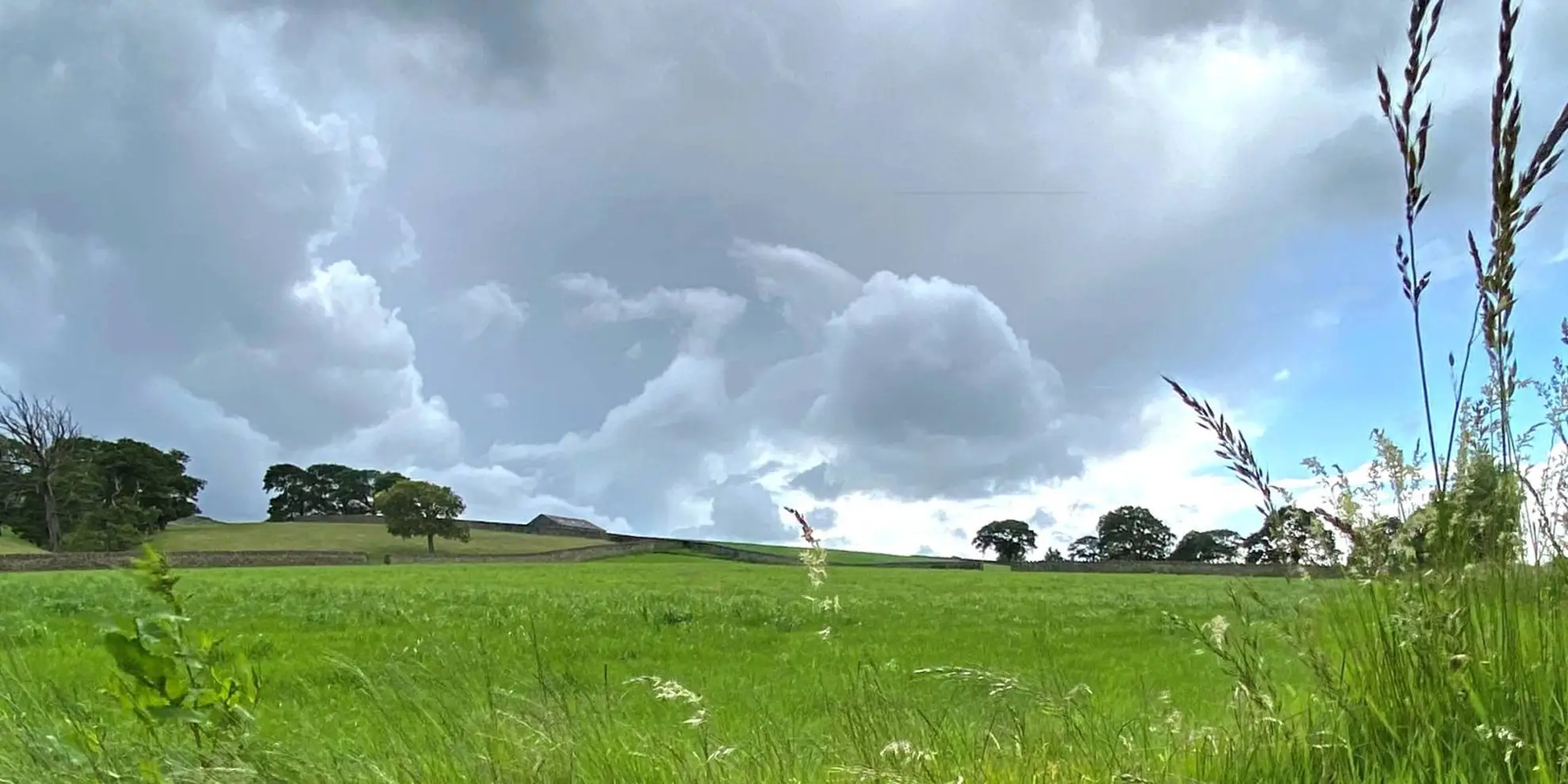 An image depicting the trail Keighley Moor Reservoir and Hitching Stone from Cowling and its surrounding area.