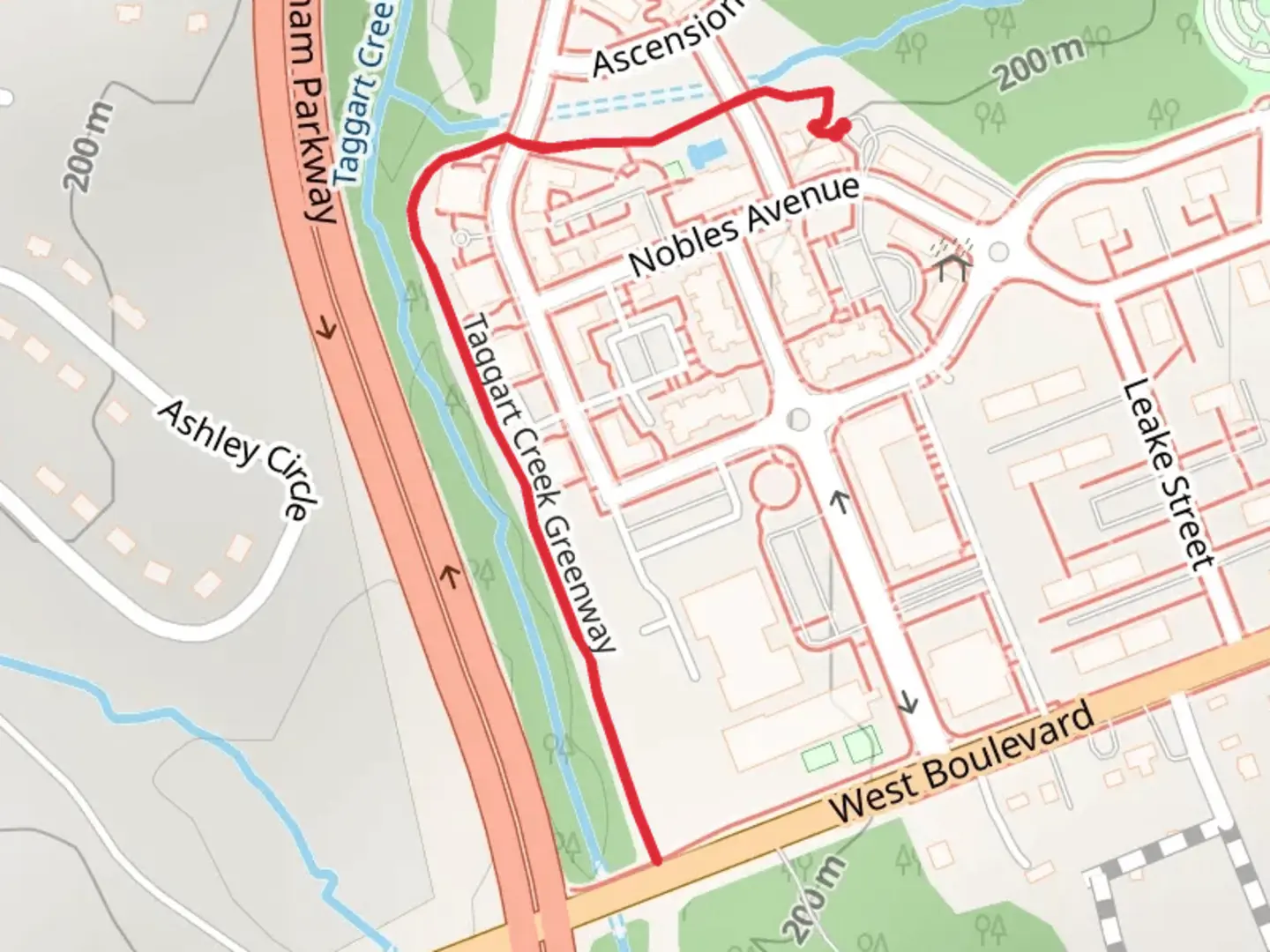 An image depicting the trail Taggart Creek Greenway and its surrounding area.