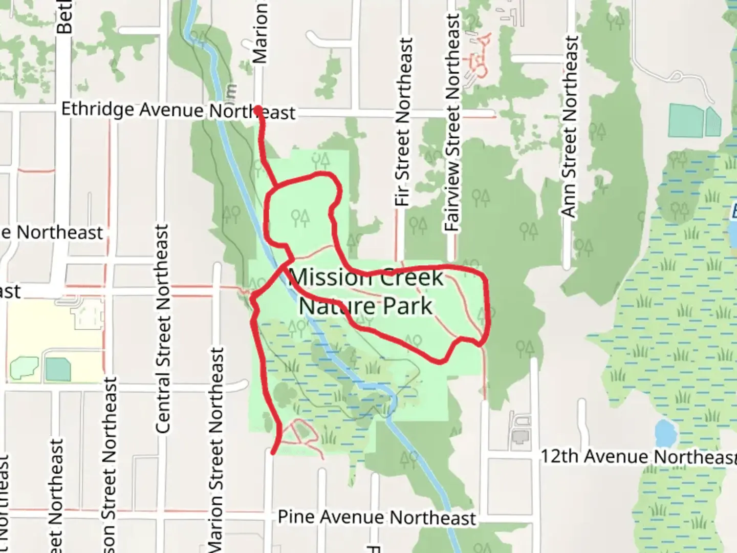An image depicting the trail Mission creek Park and Nature Park and its surrounding area.