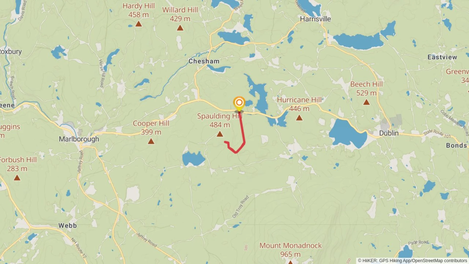 An image depicting the trail Spaulding Hill from Main Street and its surrounding area.