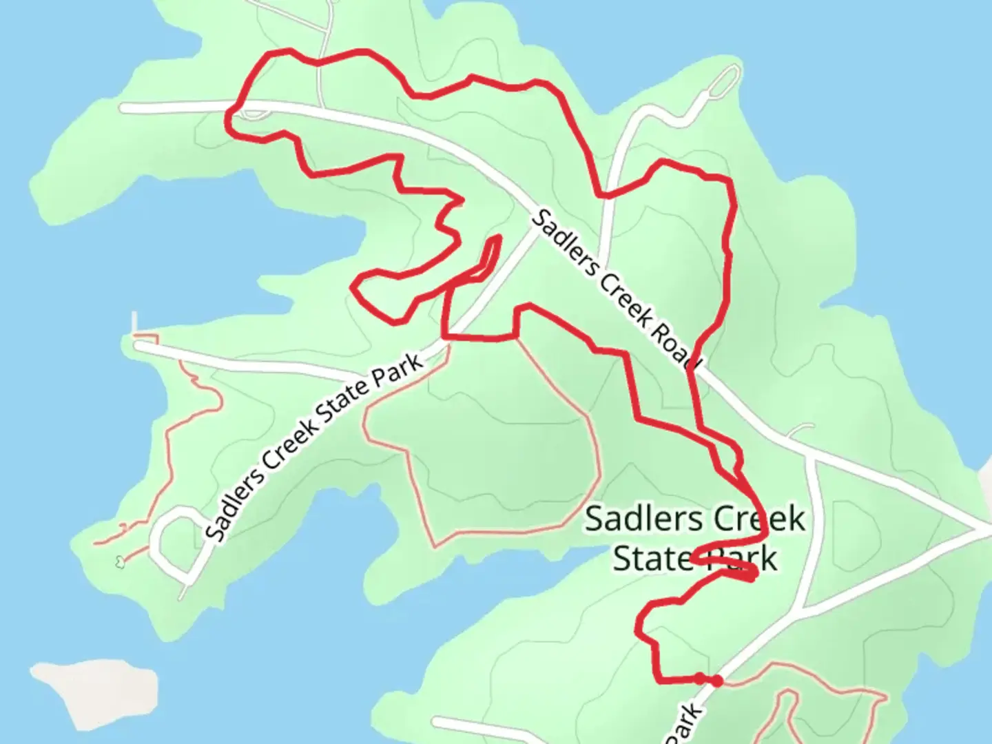 An image depicting the trail Sadlers Creek State Park Loop and its surrounding area.
