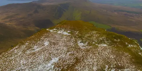 An image depicting the trail Caherconree Fort and Peak and its surrounding area.