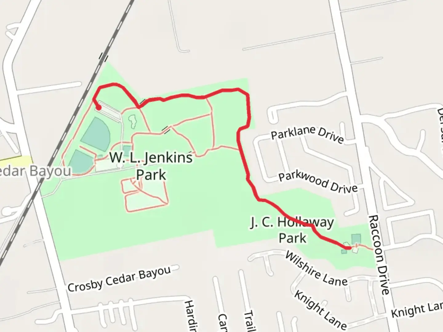 An image depicting the trail J C Hollaway Park and its surrounding area.