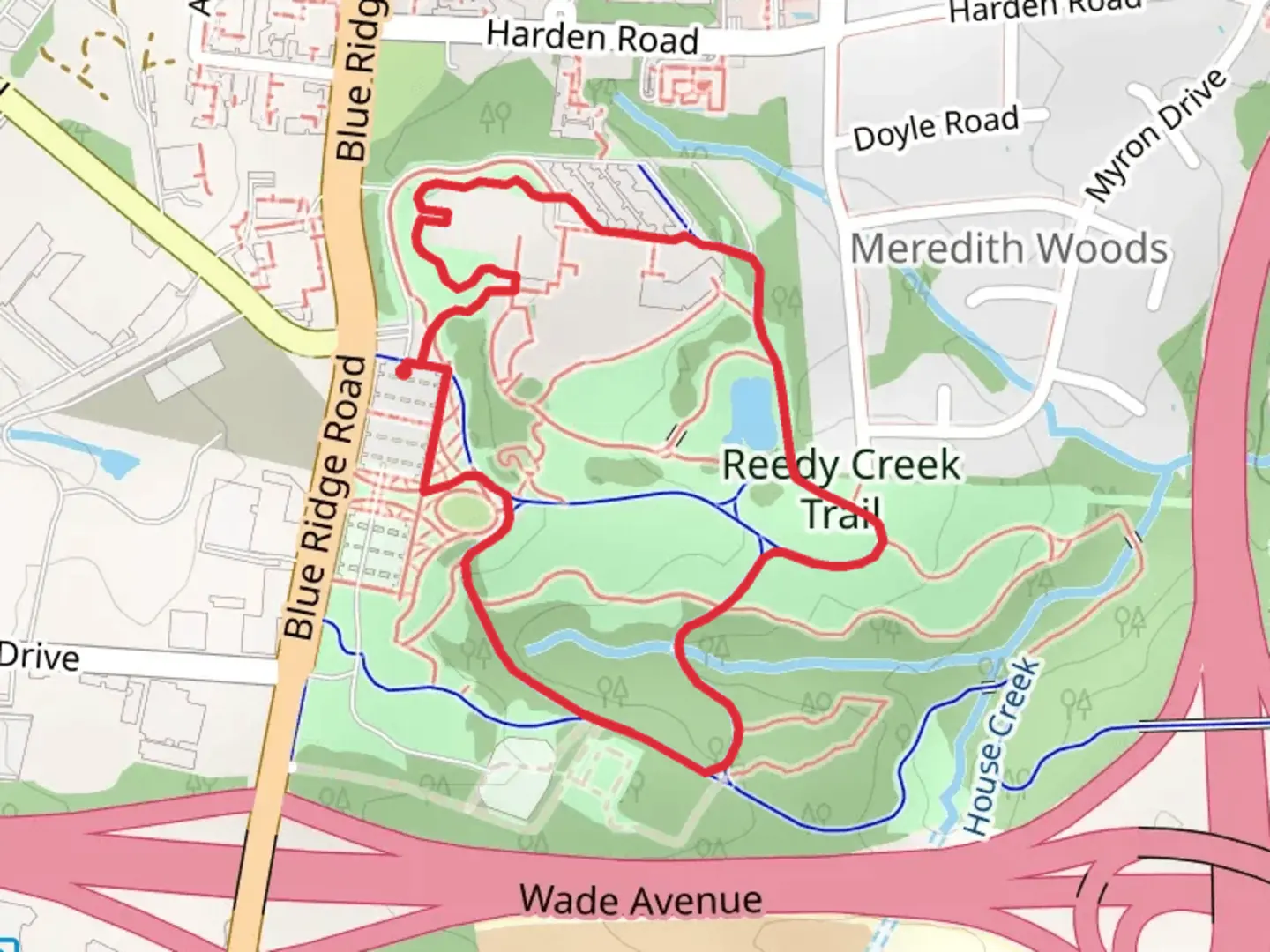 An image depicting the trail Reedy Creek Greenway and Museum Park Loop Trail and its surrounding area.