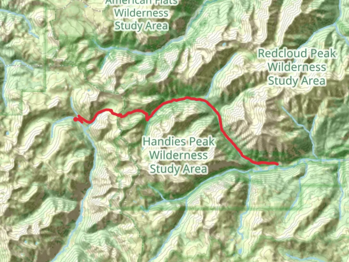 An image depicting the trail Cinnamon Pass Road Trail and its surrounding area.