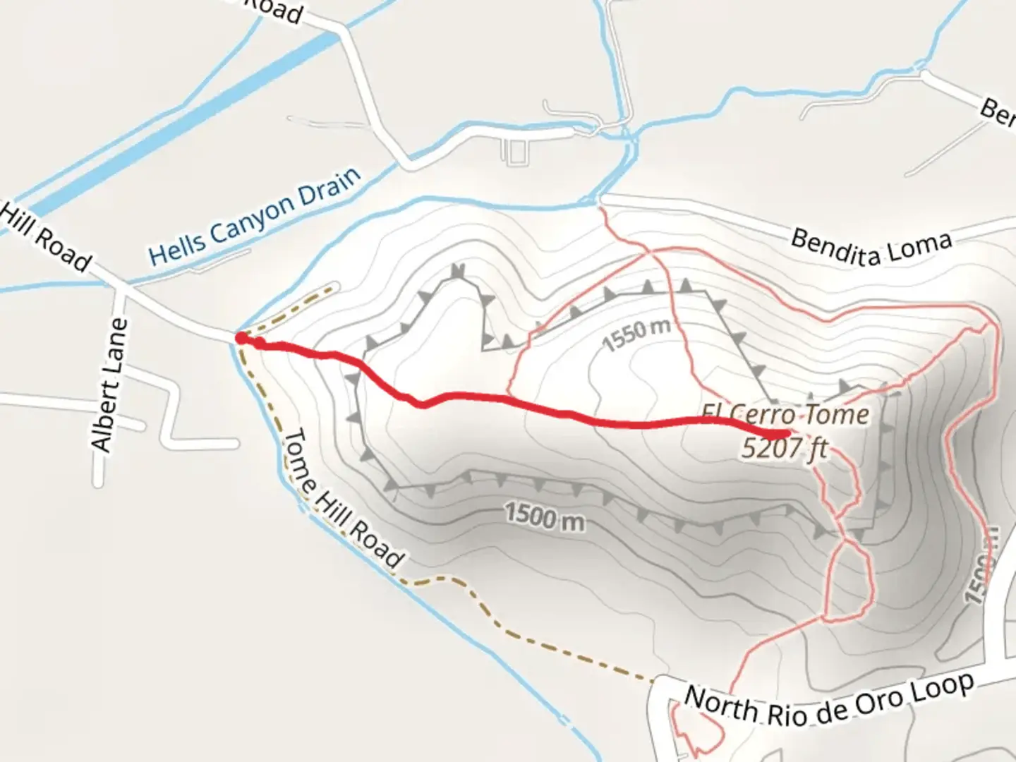 An image depicting the trail El Cerro Tome and its surrounding area.
