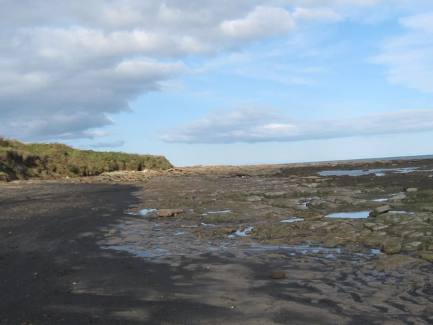 An image depicting the trail Amble to Newbiggin-by-the-Sea Walk and its surrounding area.