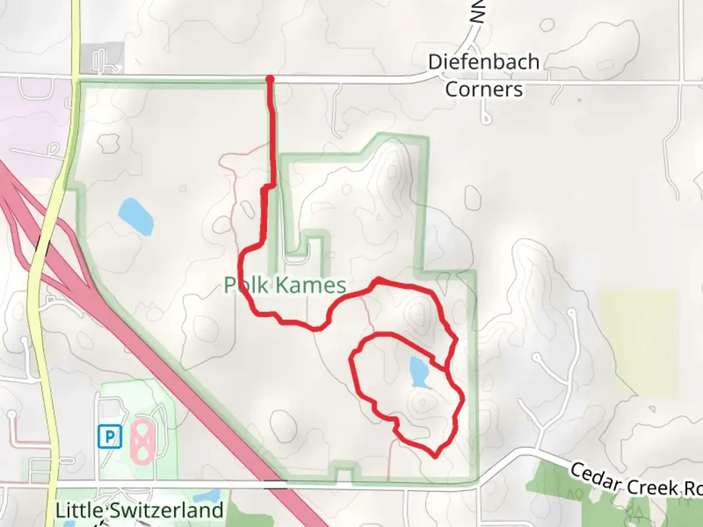 An image depicting the trail Polk Kames State Ice Age Trail Area and its surrounding area.